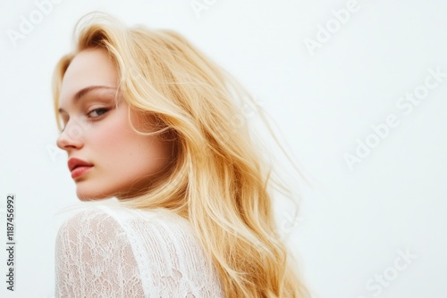 A woman with long blonde hair wearing a white shirt, suitable for editorial or commercial use