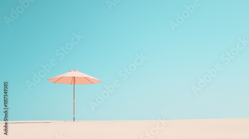 Pastel-colored parasol under clear blue sky for tranquil beach design