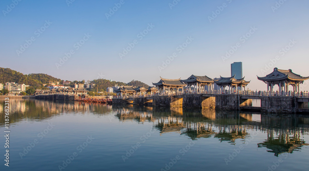 Naklejka premium Chaozhou China 20th Dec 2024: The Guangji Bridge over the Han River is majestic and timeless, a masterpiece of ancient Chinese bridge architecture.