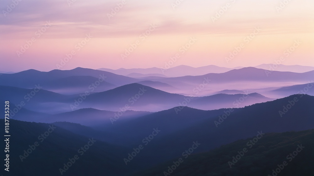 Tranquil sunrise over misty mountain range with soft pink and purple hues Tranquil sunrise over misty mountain range with soft pink and purple hues