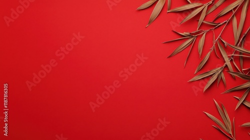 Celebrating chinese new year vibrant bamboo leaves on red background artistic still life festive atmosphere close-up view photo