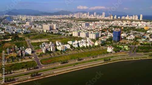 The road is on the outskirts of the city. 

Aerial drone shooting in Nha Trang, Vietnam.