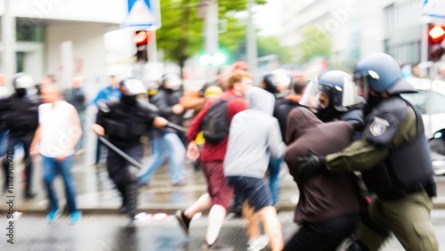 Protest Clash Blur – A blurred image of an intense clash between riot police and protestors.
 photo