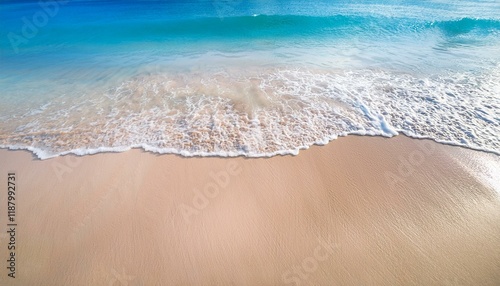 波打ち際、青い海と砂浜。（The water's edge, blue sea and sandy beach.）
 photo