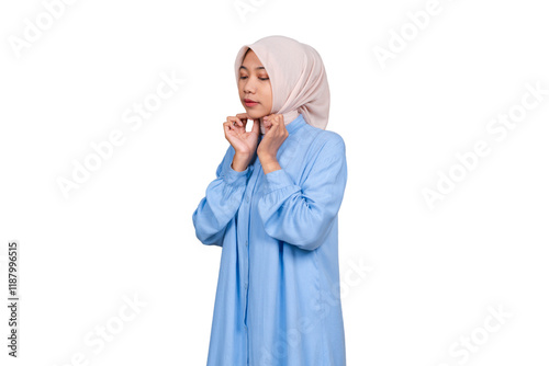 Woman adjusting hijab isolated transparent photo