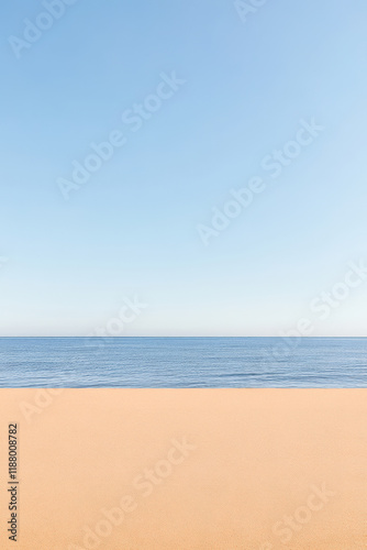 Calm seashore with gentle waves and clear blue sky on a serene day