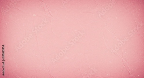 A dusty pink background with a vintage feel ideal for retro or nostalgic designs photo