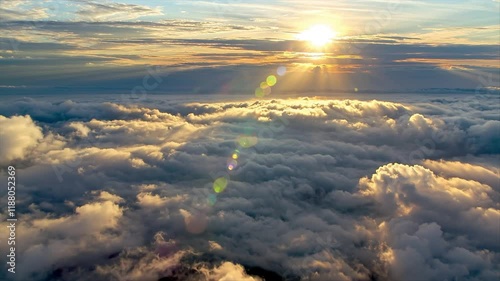 Stunning Aerial View of Sunset Clouds with Sunlight Beaming Through Fog: A Mesmerizing Cloudscape Featuring Radiant Light Rays in Realistic 4K Animation