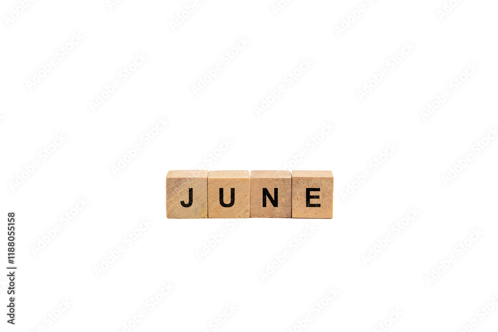 Wooden blocks with June text isolated on white background Wooden blocks with June text isolated on white background