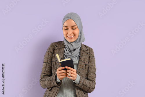 Young Muslim woman with Kor...