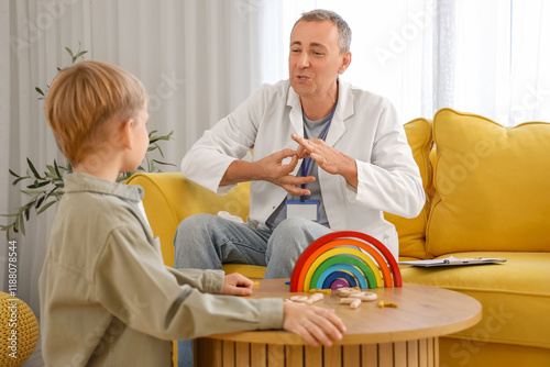 Male speech therapist worki...