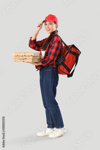 Female Asian courier with p...
