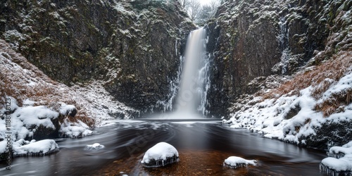 Winter at Grey Mare s Tail Waterfall showcases the natural beauty of cascading water in a serene landscape. The Grey Mare s Tail Waterfall, with its stunning flow, captivates in wintertime elegance. photo