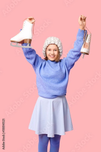 Happy girl with ice skates ...