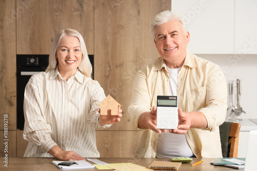 Senior couple with house fi...