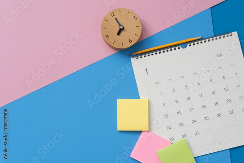 close up of calendar on the colorful table background, planning for business meeting or travel planning concept