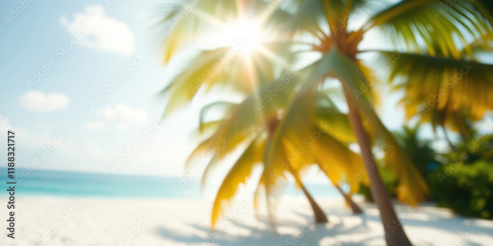 Obraz premium A Blurry View of Palm Trees on a Beach with Sun Shining Through the Foliage