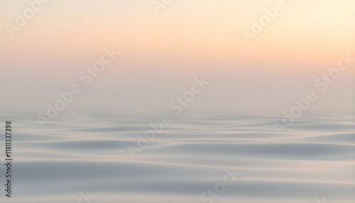 a large body of water with a sky in the background