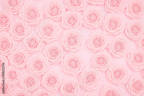 Densely packed pale pink roses with velvety texture blurred bg photo