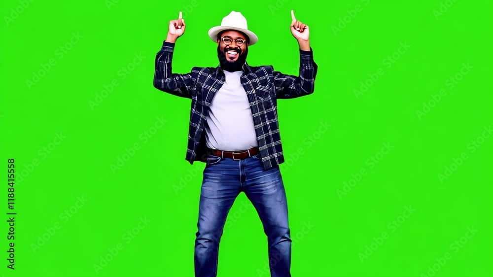 Joyful Celebration: A jubilant man with a beard, wearing a hat and plaid shirt, celebrates with arms raised against a vibrant green screen.  