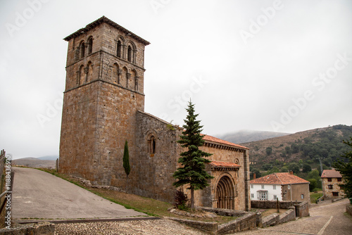 Romanesque collegiate church of San Pedro de Cervatos from the 12th century. Cantabria, Spain.
