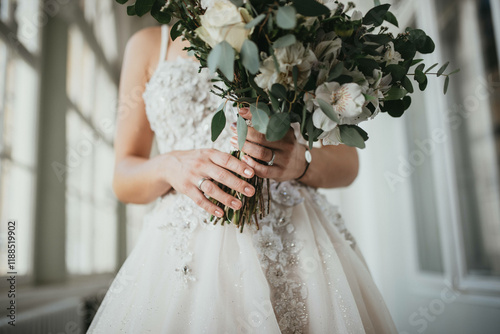 Beautiful bride in a wedding dress with biedermeier.