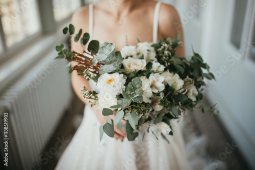 Beautiful bride in a wedding dress with biedermeier.
