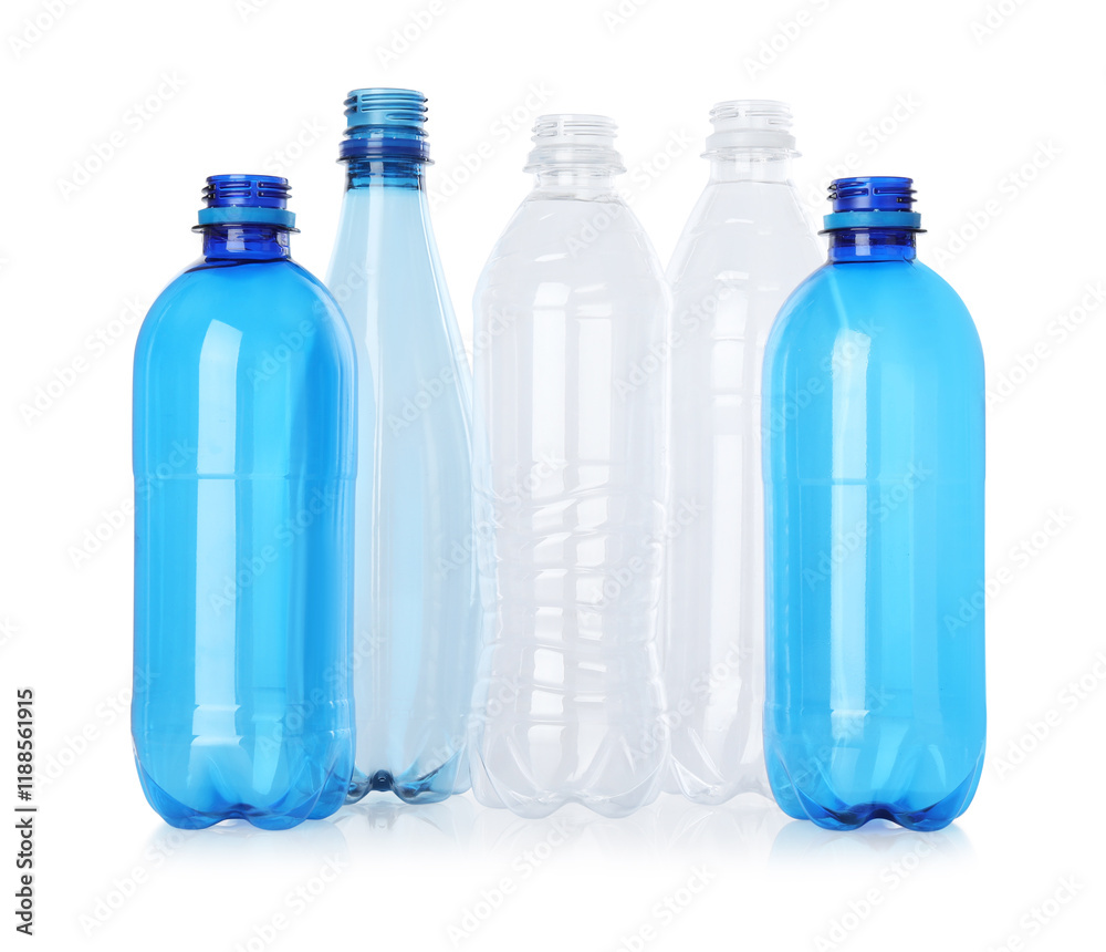 Naklejka premium Many empty plastic bottles isolated on white