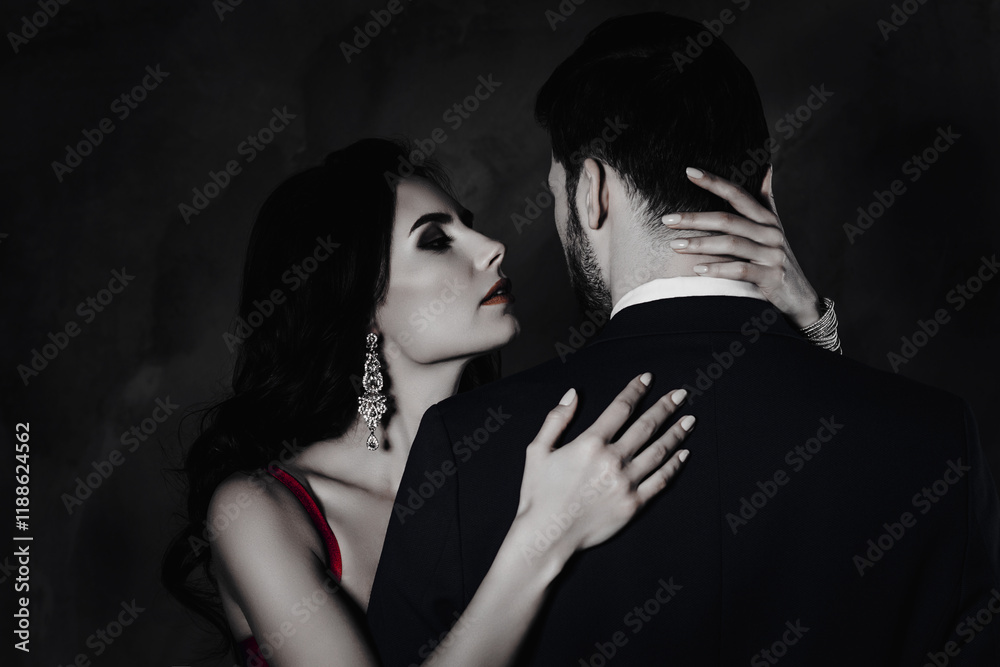 © deagreez - Dream wish temptation seduction pleasure concept. Charming pretty lady with bijoutery embracing mysterious stranger with rear view enjoying his smell isolated on grey background