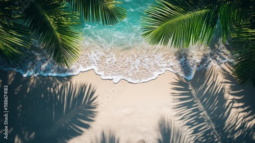 Fototapeta Naklejka Na Ścianę i Meble -  A serene view of a tropical beach with turquoise water and palm tree shadows creates an ideal relaxation spot