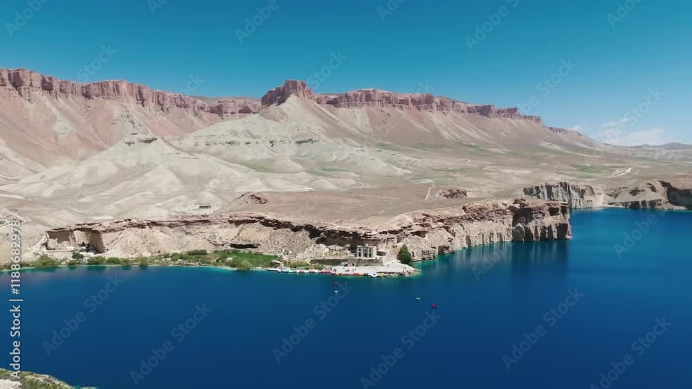 Aerial View of a Beautiful Lake Nestled Between Majestic Mountains Aerial View of a Beautiful Lake Nestled Between Majestic Mountains