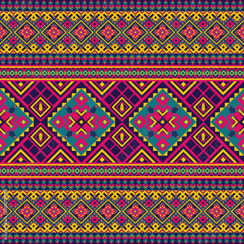 A vibrant geometric pattern featuring symmetrical diamond motifs, bold colors, and intricate ethnic-inspired designs, perfect for textiles and decorative use.
