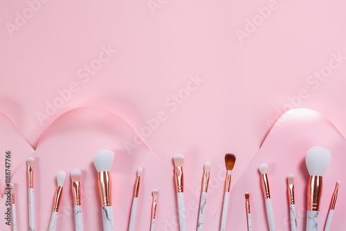 Makeup brushes, soft pastel pink background, cosmetic tools, beauty accessories, flat lay photography, minimalist composition, white powder puffs, professional makeup kit, beauty blogger setup, femini photo