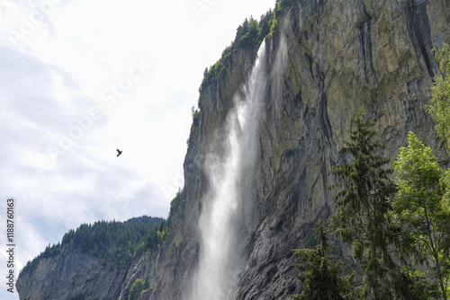 Majestic waterfall cascading down cliffside