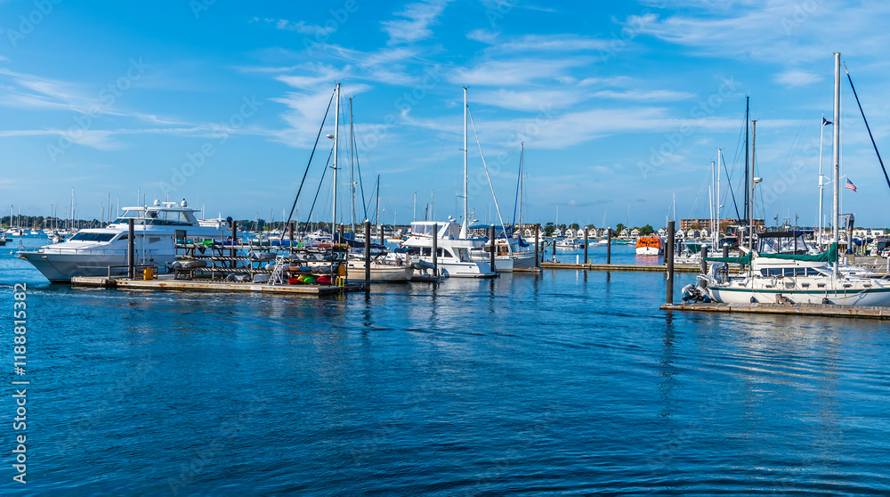 Fototapeta premium A view from the harbor of boats moored off Newport, USA in the fall