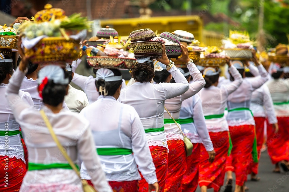 A group of unrecognizable women during a traditional ceremony in front of a temple A group of unrecognizable women during a traditional ceremony in front of a temple
