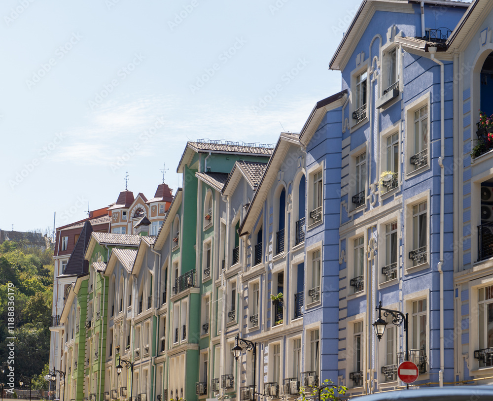 Naklejka premium Multicolor modern Facade of Houses Buildings. Bright windows architecture street