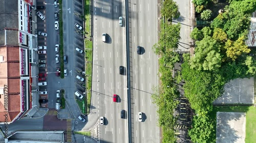 Top down aerial footage of the traffic on the roads in a residential district in Kajang, Malaysia photo