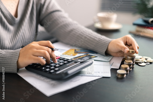 Finance bank tax expense accounting budget money businessman hand use calculator Financial calculate accountant close up calculator with graph chart write office desk Business expense analysis saving