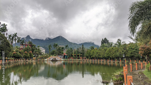 A large swimming pool with mountain views in Singkawang, West Kalimantan photo