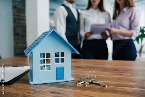 Real estate agents, office setting, blue paper house model, house keys, business attire, professional atmosphere, property sale, homebuying concept, realtor meeting, desk with documents, blurred backg photo