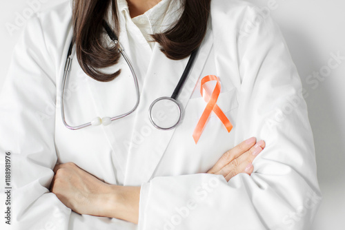 Woman doctor with orange ribbon for Leukemia, Kidney cancer day, world Multiple Sclerosis, CRPS, Self Injury Awareness, closeup
