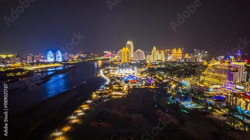 Explore the vibrant night lights of Xishuangbanna Jinghong City through a stunning time lapse experience photo