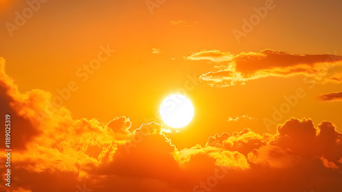 Fototapeta Naklejka Na Ścianę i Meble -  Panorama of an orange sunset sky with a bright sun