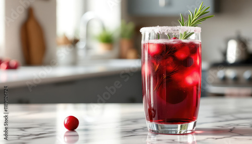 Wallpaper Mural Refreshing cranberry drink garnished with rosemary on a marble countertop in a bright kitchen Torontodigital.ca