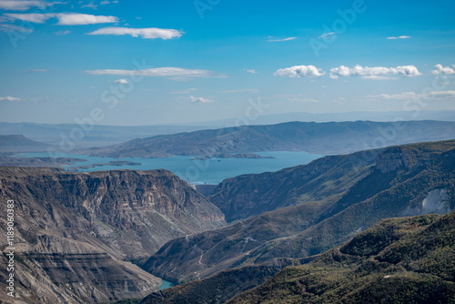 Mountain landscape. A mountain lake is visible in the background.