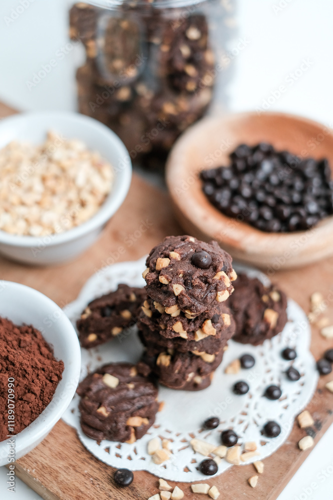 tasty vegan chocolate oats cookies with peanut butter on wooden background recipe or cook book photo. Homemade chocolate biscotti cookies with walnuts. tasty vegan chocolate oats cookies with peanut butter on wooden background recipe or cook book photo. Homemade chocolate biscotti cookies with walnuts.