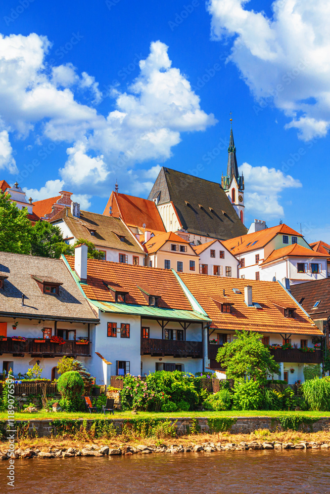 Summer cityscape - view of the Vltava river embankment in the historical center of Cesky Krumlov, Czech Republic