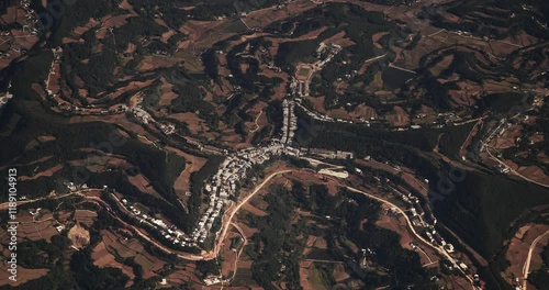 Surrounding Areas Of Santai County, China. View From Airplane Window On Landscape Of China. Porthole View Or Called Bull's-eye Window. Aerial View On Fields And Forests. Dense Private Buildings. Many photo