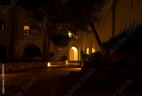 Scenic path to the house in the garden in summer. Night 